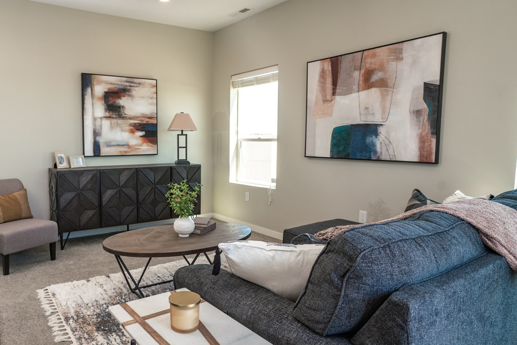 a living room with a couch and a coffee table