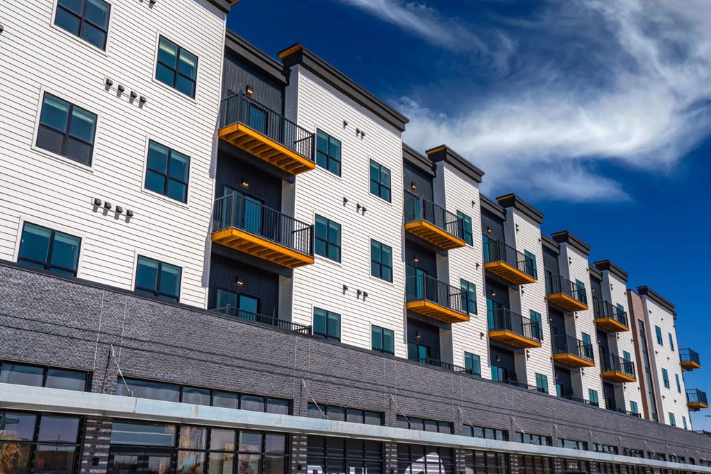 a view of the exterior of an apartment building