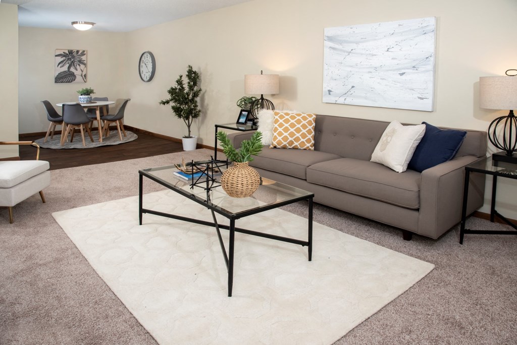 a living room with a couch and a coffee table