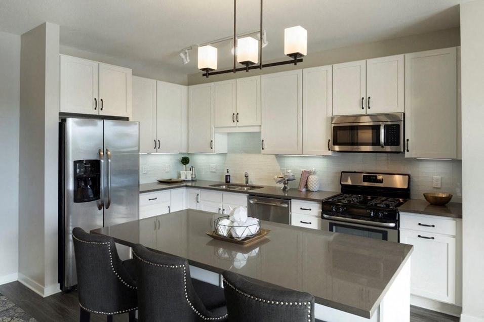 Kitchen Bar With Granite Counter Top Residences at 1700 Model Kitchen