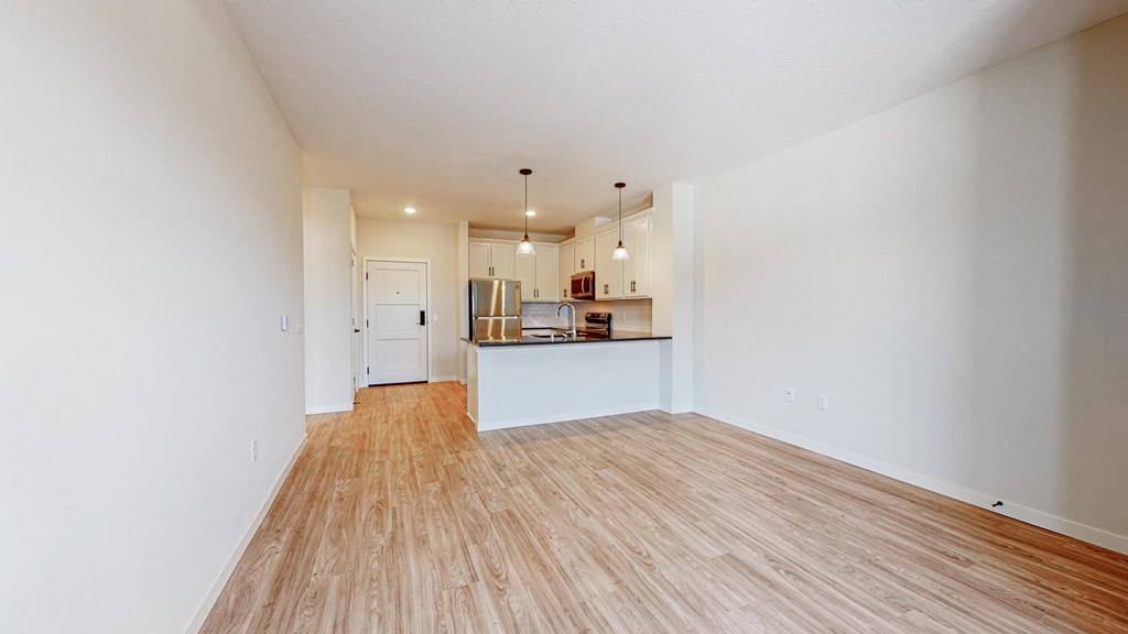 Living Area With Kitchen View at Shady Oak Crossing, Minnetonka, MN