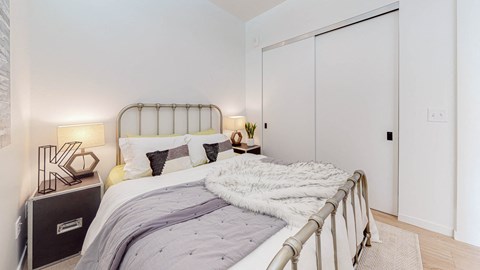 Cozy bed at CityLine Apartments, Minneapolis, Minnesota