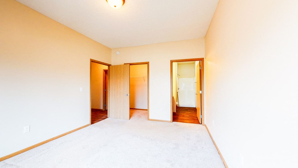 master bedroom with private bath and walk-in closet