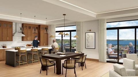 A modern kitchen with a dining table and chairs.