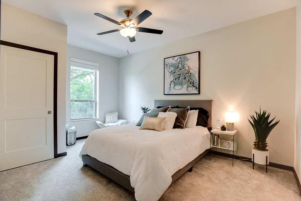 spacious bedroom with ceiling fan at Lake Jonathan Flats, Chaska, 55318