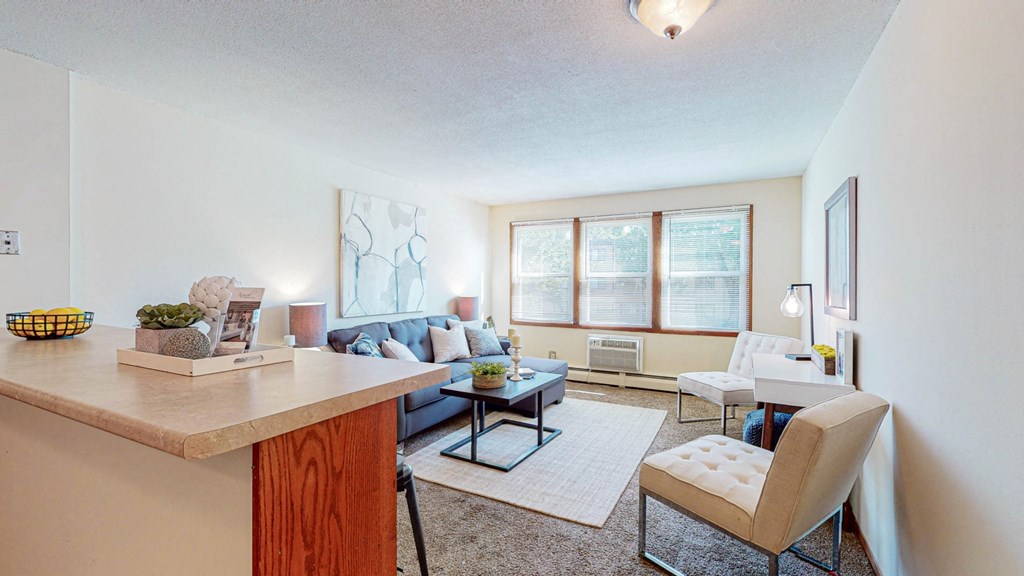 a living room with a couch and a table