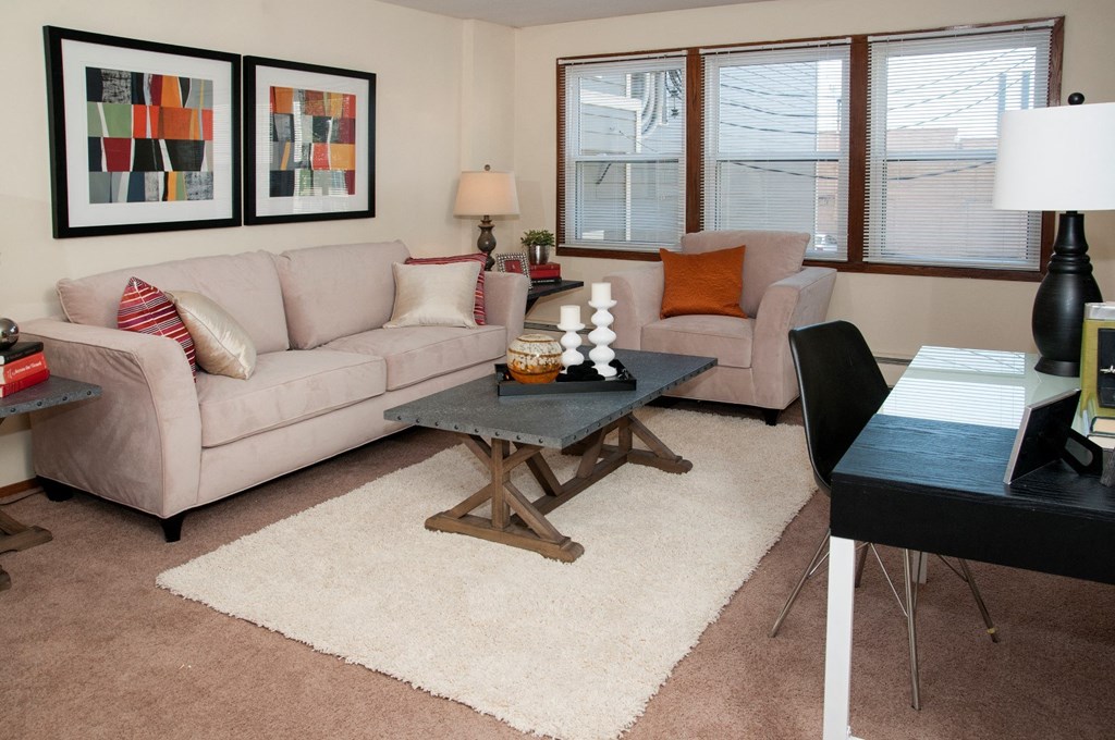 a living room with a couch and a table