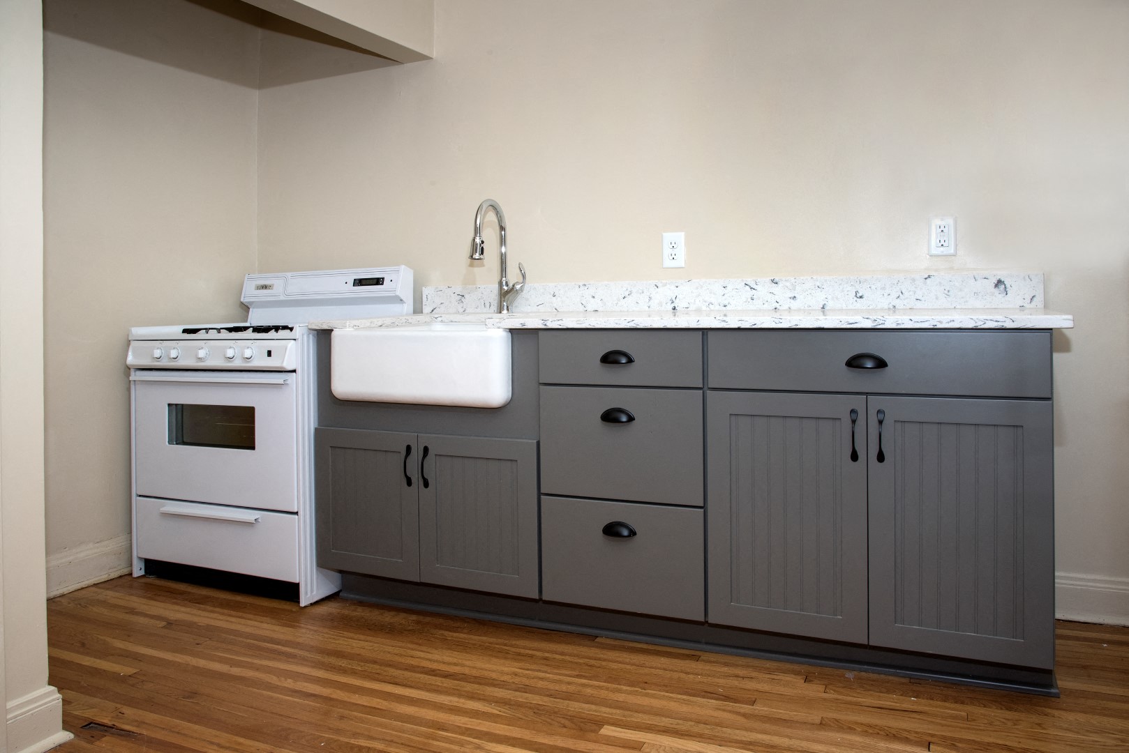 Grey Cabinetry with Marble Counter Top at 3500 Dupont Apartments