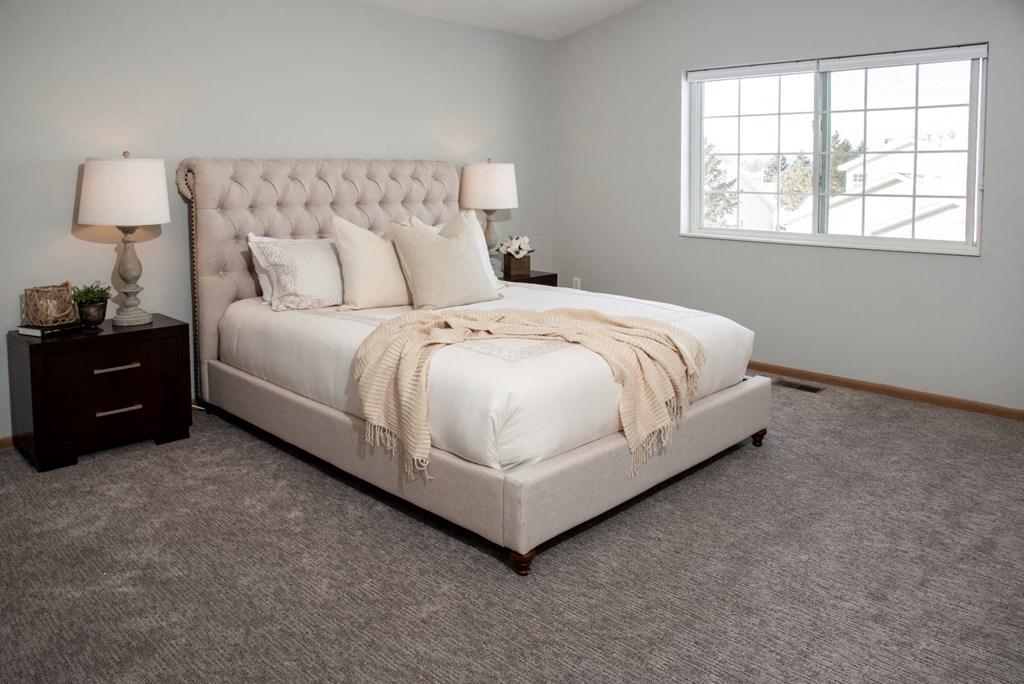 Master bedroom with vaulted ceiling