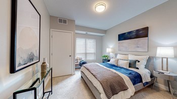 Master Bedroom at Grove80 Apartments, Cottage Grove, Minnesota - Photo Gallery 5