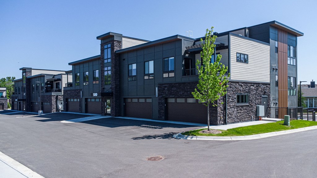 a large building with a street in front of it