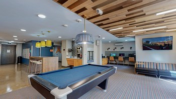 resident lounge with billiards and seating and tech area - Photo Gallery 20