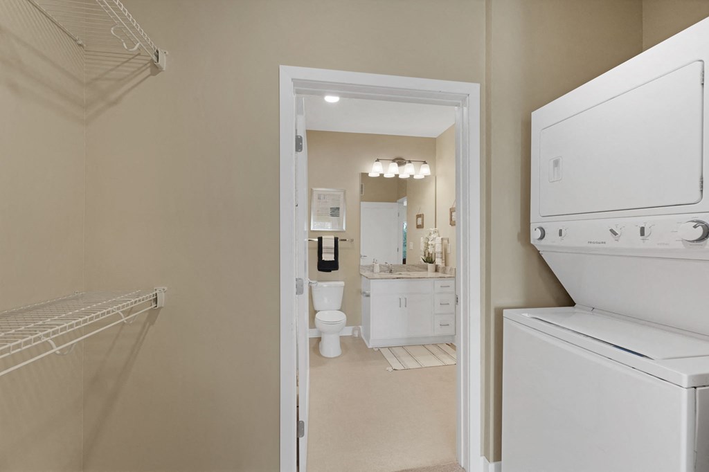 a laundry room with a washer and dryer