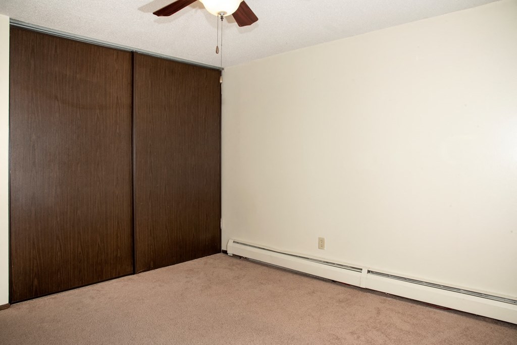 first bedroom, spacious closets, ceiling fan