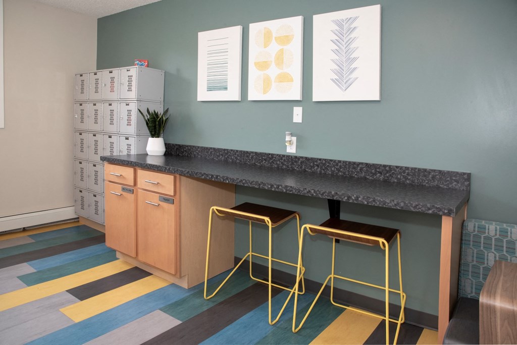 laundry lounge with lockers for laundry storage