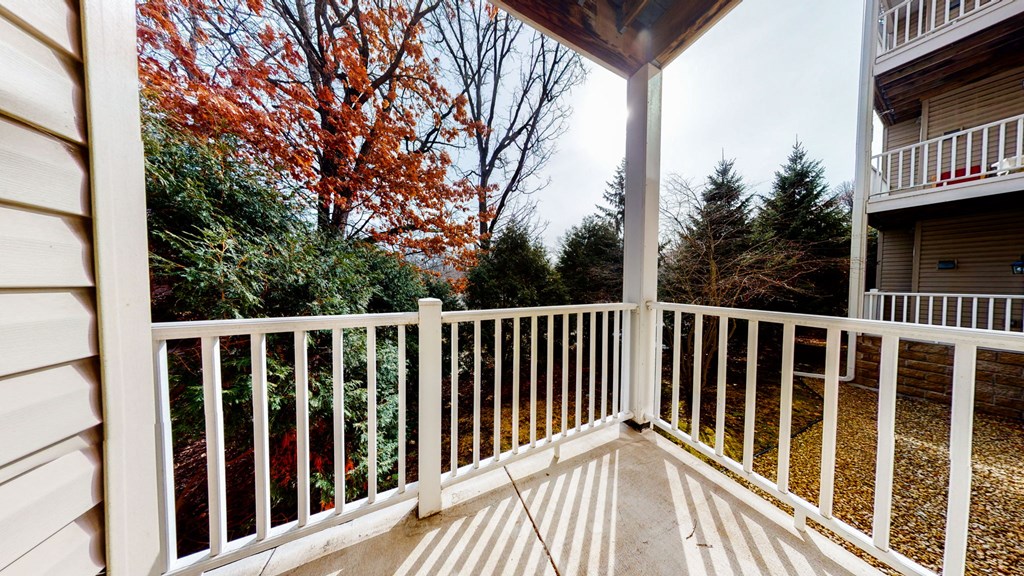 1 bedroom - pine floor plan - spacious patio with wood views