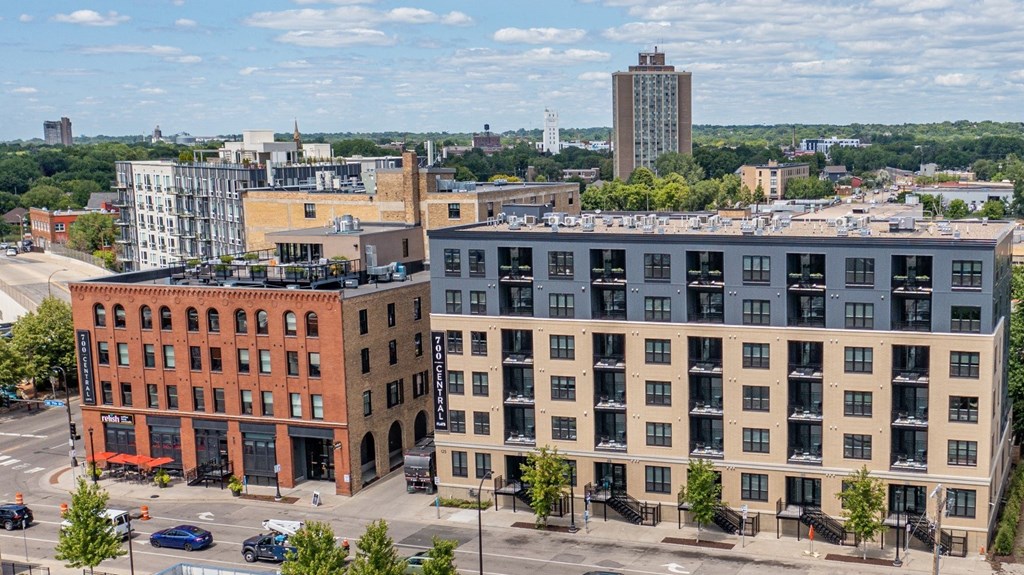 an aerial view of several buildings in a city