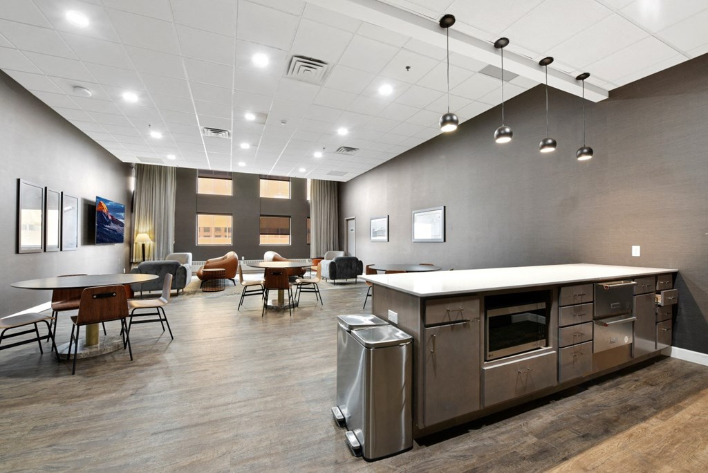 an open floor plan with a kitchen and dining area