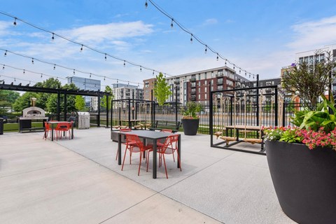 Outdoor Patio With Grill Station at AIRE MSP Apartments, Bloomington, Minnesota