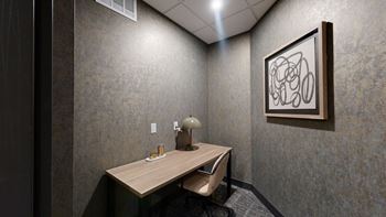 A room with a desk and a lamp at Ardor on the Bluffs South Loop Residences Apartments, Bloomington, 55425