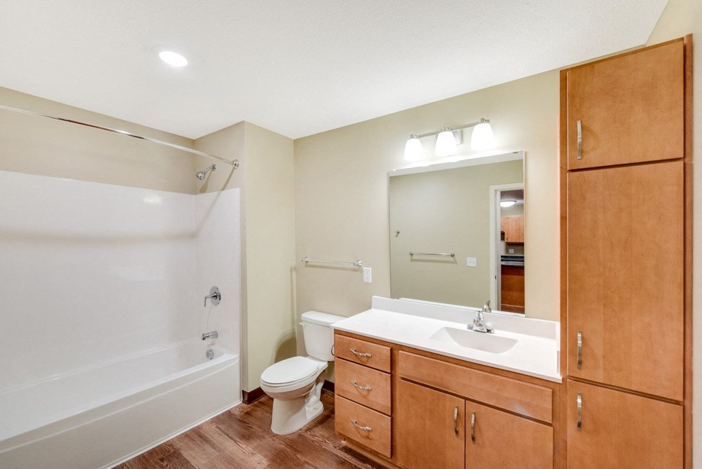 the preserve at ballantyne commons apartment bathroom with toilet sink and tub