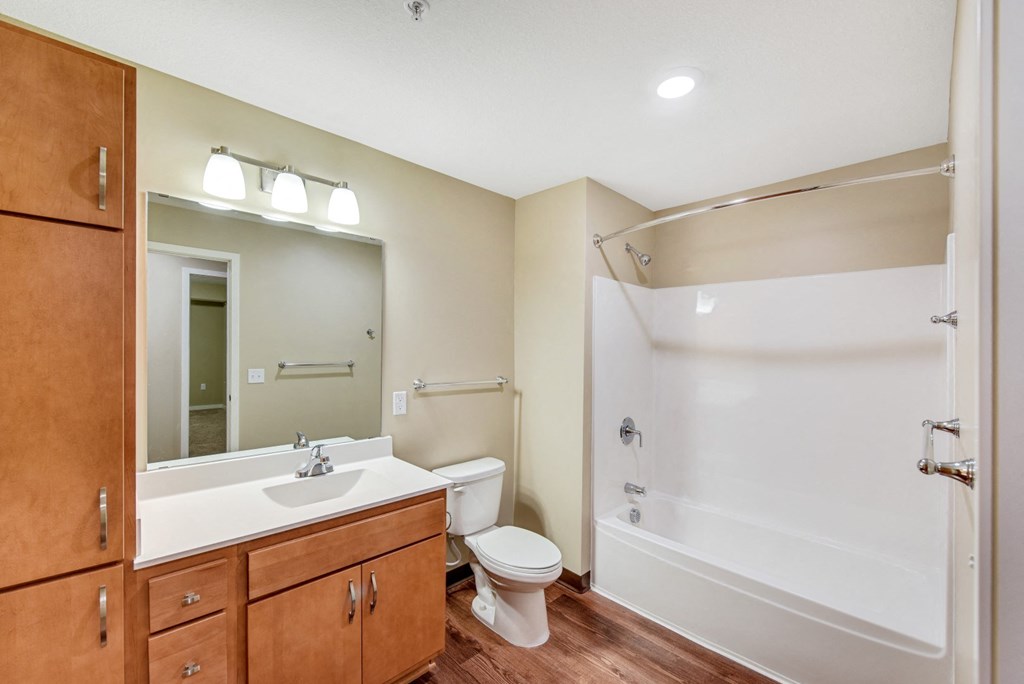 a bathroom with a sink toilet and a shower