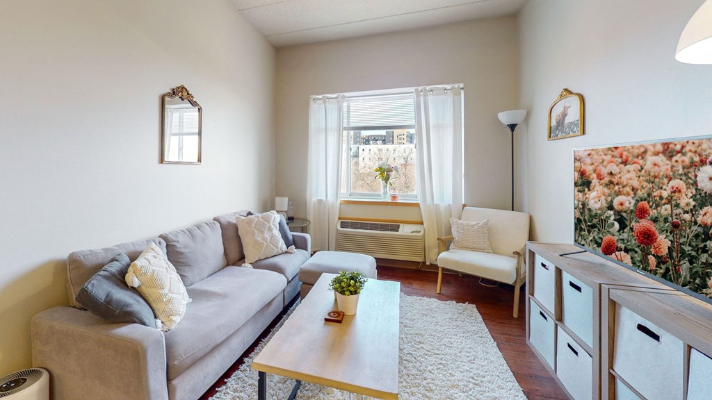 a living room with a couch and a coffee table