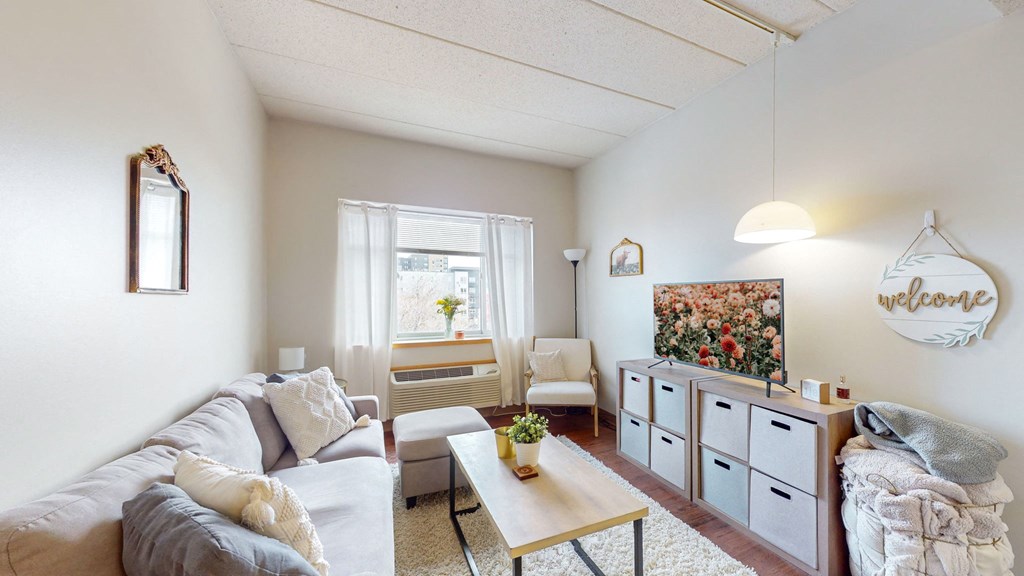 a living room with a couch and a coffee table