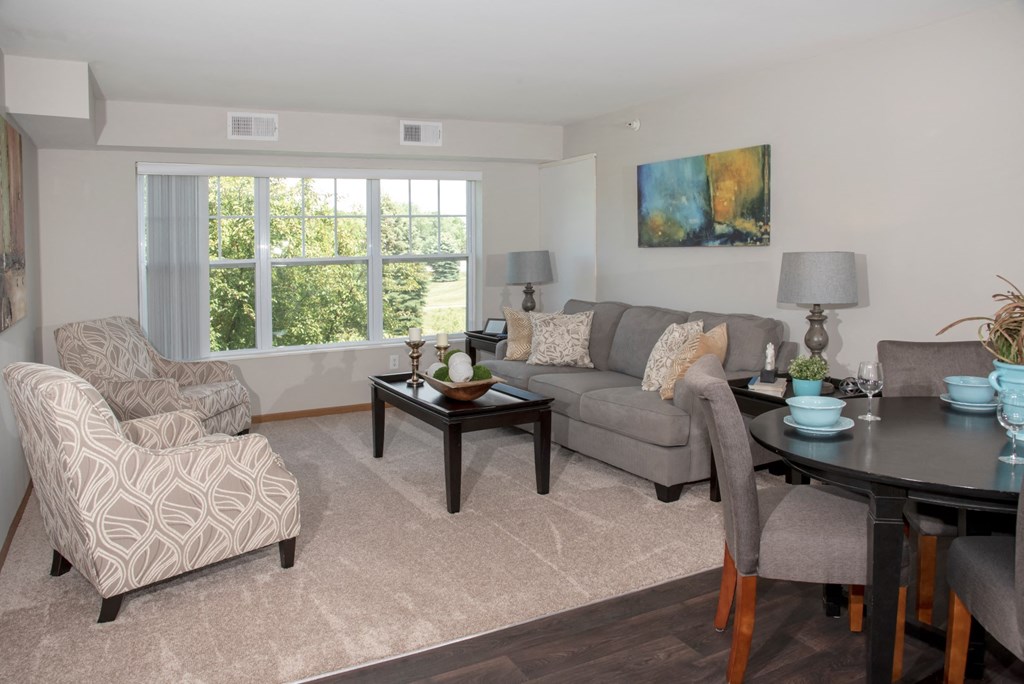 spacious living room with large window