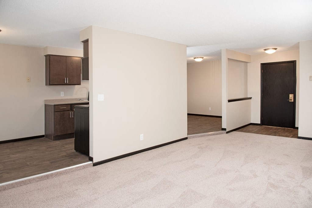 Large spacious living area with seperate areas for dining and office or den