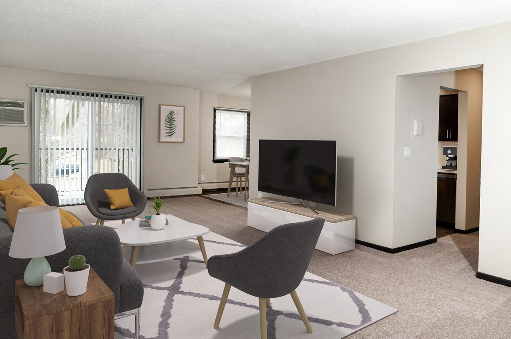 a living room with a couch and a table and a television