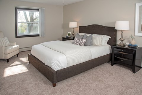 one plus den model, spacious bedroom