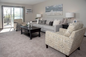one plus den model, spacious living room with balcony - Photo Gallery 3