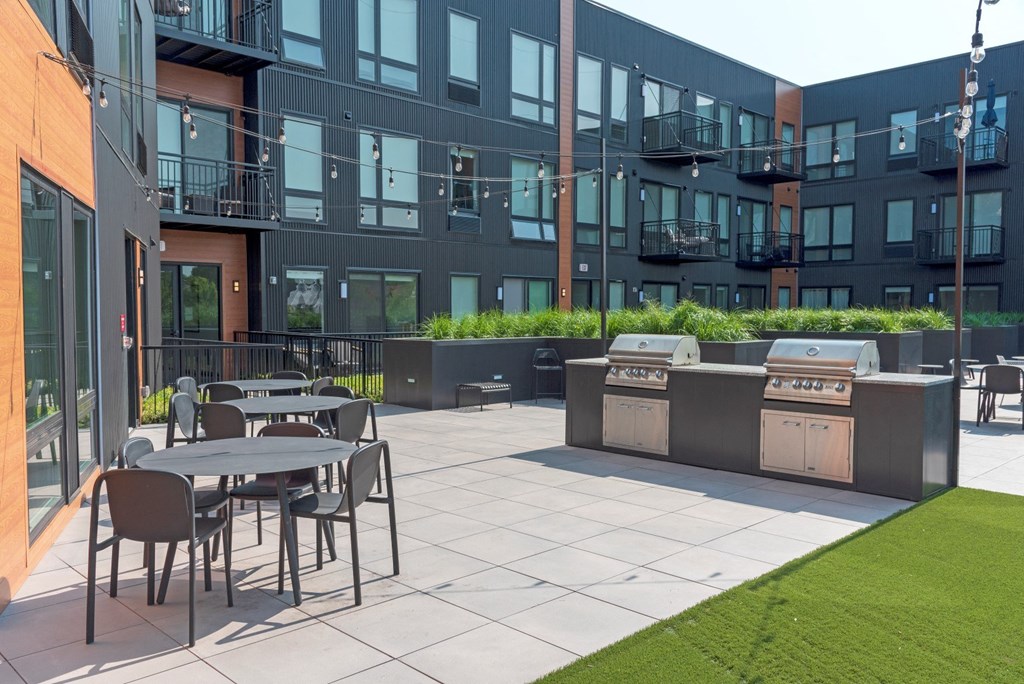Outdoor Grill With Intimate Seating Area at CityLine Apartments, Minnesota, 55406