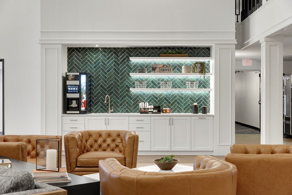 a living room with two brown couches and a coffee table