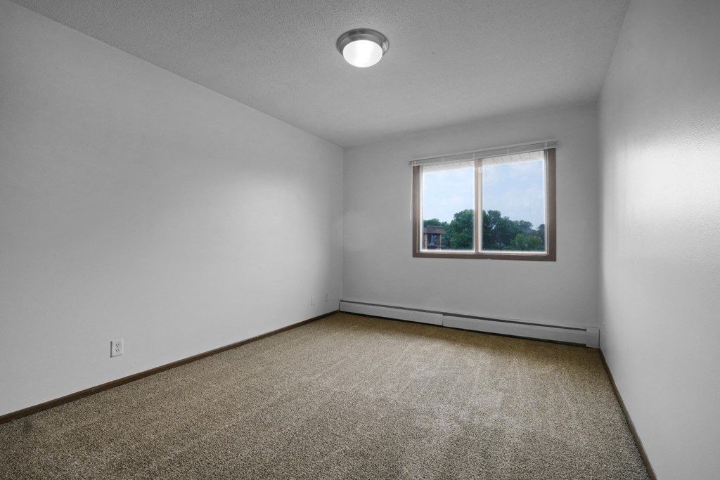 an empty room with a window