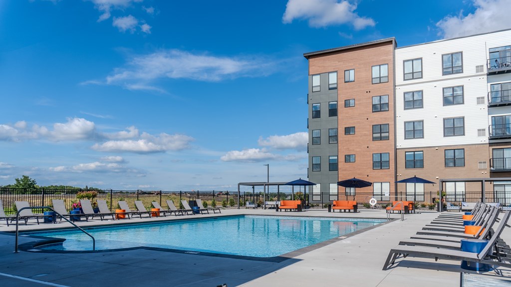 Pool With Lounge Chairs at The Edison at Maple Grove, Maple Grove, MN