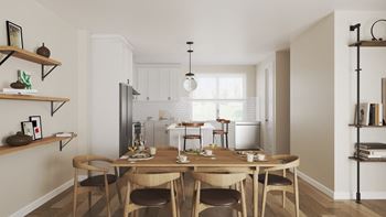 a kitchen and dining room with a table and chairs