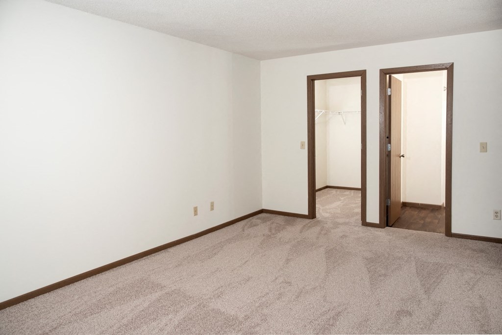 Bedroom with walk in closet