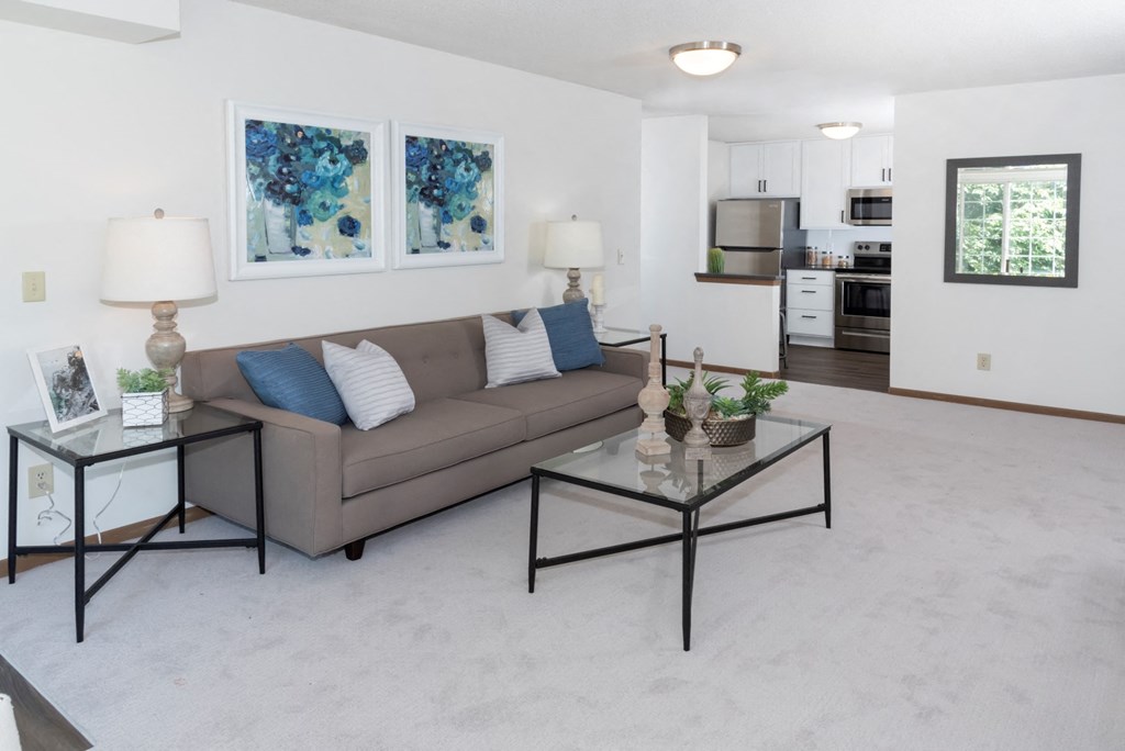 a living room with a couch and a coffee table