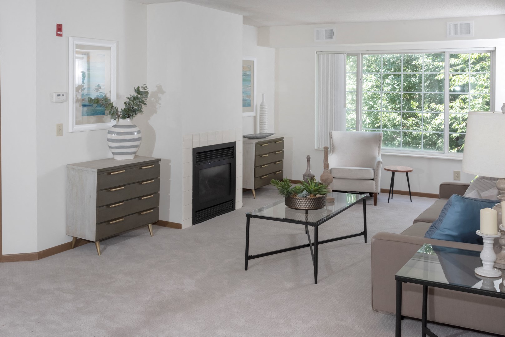 a living room with a couch and a table