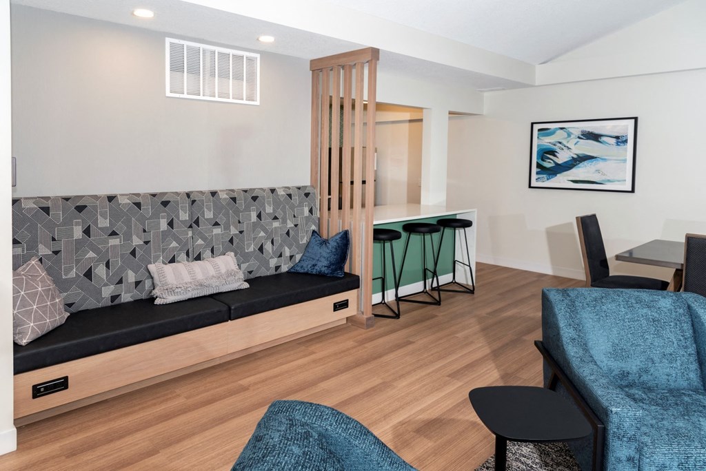 a living room with a couch and a table