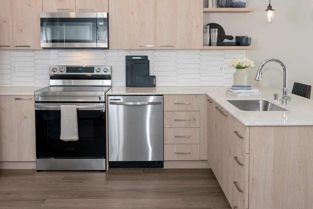 Electric Range In Kitchen at Grove80 Apartments, Cottage Grove, MN