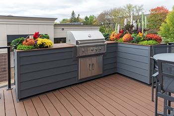 Outdoor deck with grill stations