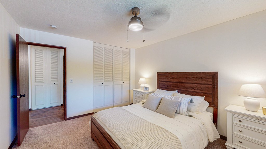 Large bedrooms with closets at Hillsborough Apartments, MN