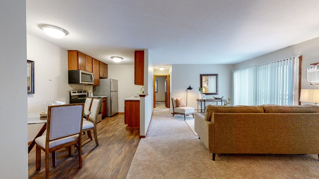 a living room with a couch a chair and a table