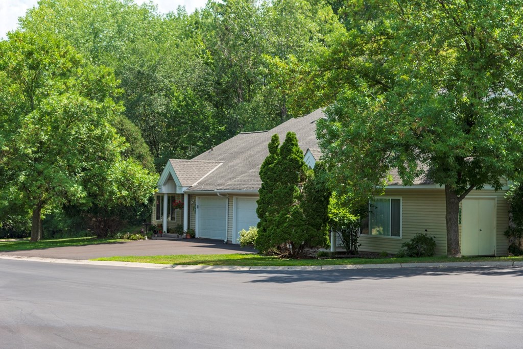 a house with trees in the background