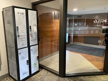 A glass door with a sign that says