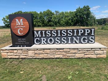 a sign with the words mississippi crossings on it