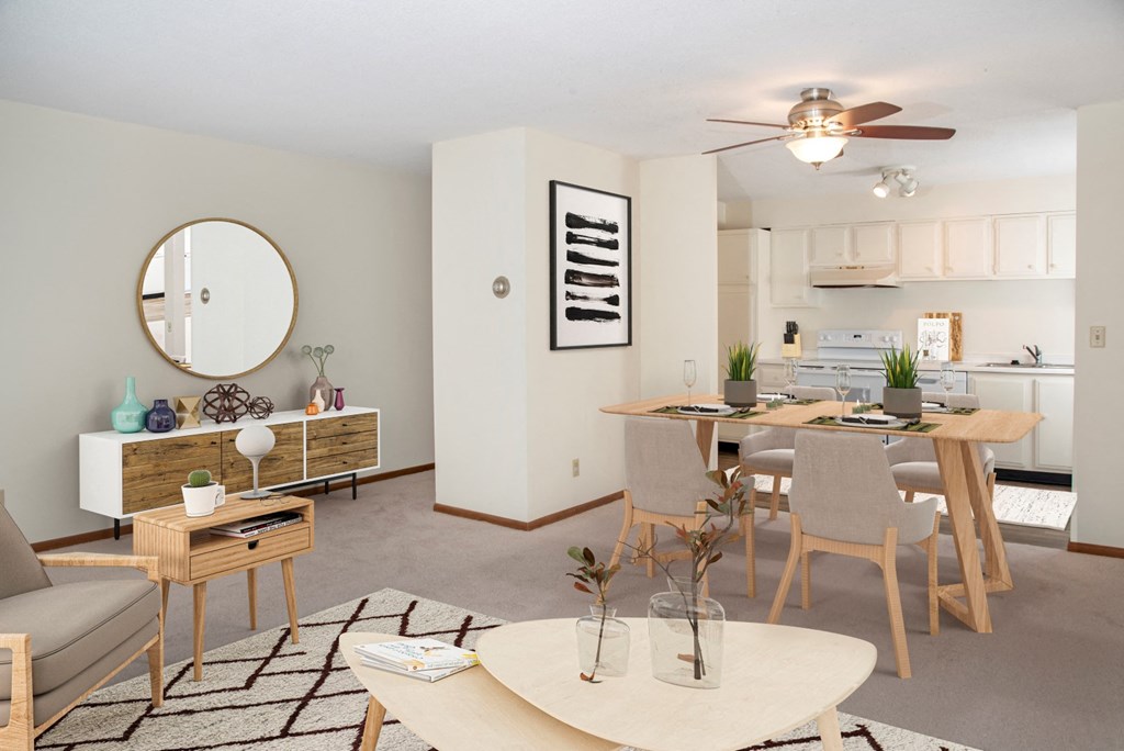 a living room with a dining room and a kitchen